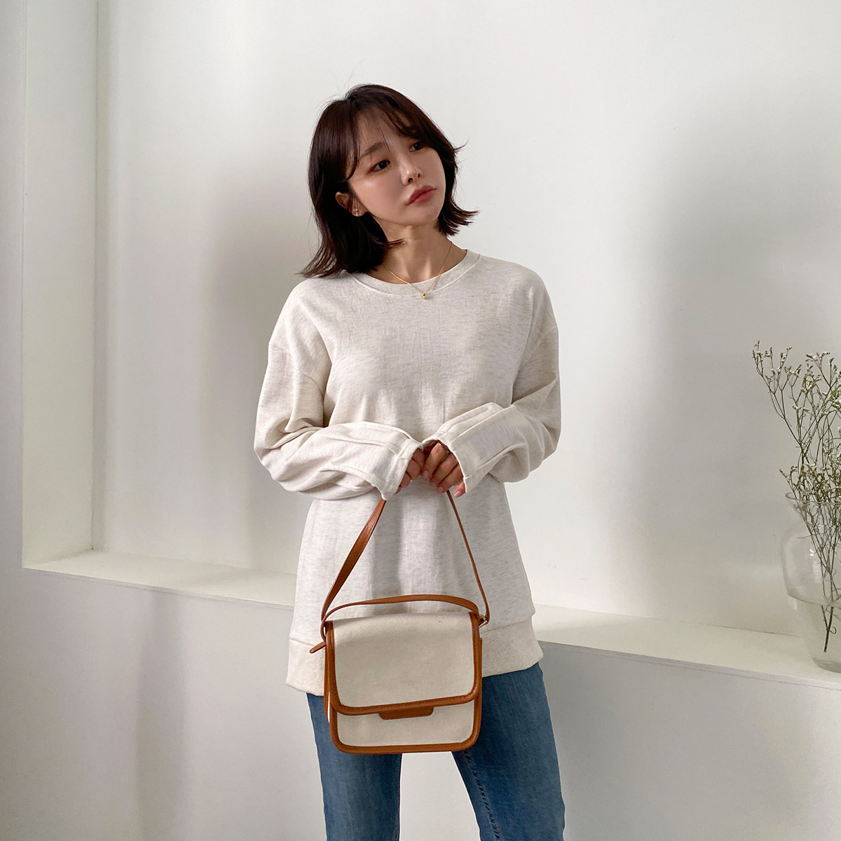 리엘라 나블링 라운드넥 소매 핀턱 루즈핏 맨투맨